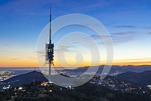 Communications tower at dusk photo